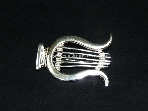 Souvenirs from Greece: APOLLO LERA PIN Greek statues Greek Busts Sculptures Elegant souvenirs from Greece handmade greek jewellery pin with the lera the symbol of the ancient greek god of music Apollo made from sterling silver 925, weighing 6.5g. Exceptional greek gifts that stand out.