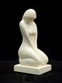 Souvenirs from Greece: Female kneeling greek cycladic art statue Greek statues Cycladic art statues Lovely greek cycladic art inspired souvenirs handmade cycladic art female statue. The greek cycladic art sculpture shows a woman with kneeling with her hands between her feet. The cycladic sculpture has an abstract refined figure and is an excellent greek art decoration 