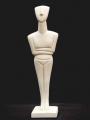 Souvenirs from Greece: Standing female greek cycladic art statue Greek statues Cycladic art statues Outstanding greek cycladic art souvenirs handmade female statue from the early cycladic period 2800-2300BC. The greek cycladic art statue of a  naked woman  standing with folded arms a symbol of feritlity. The cycladic sculpture has an abstract refined figure and is an elegant greek art decoration gift.