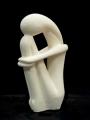 Souvenirs from Greece: Female figure greek cycladic art statue Greek statues Cycladic art statues Fascinating greek cycladic art inspired souvenirs handmade cycladic art female statue. The greek cycladic art sculpture shows a woman with her head leaning against her knees and her hands around ther feet. The cycladic sculpture has an abstract refined figure and is an excellent greek art decoration gift.