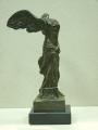 Souvenirs from Greece: Nike of Samothrace greek bronze statue Greek statues Bronze statues One of the most popular greek souvenirs handmade greek bronze statue Nike of Samothrace,  or Winged Victory of Samothrace,  replica of the famous marble 2nd century BC sculpture of Nike the ancient greek goddess. The bronze sculpture sits on a marble base and is one of the best greek art gifts.
