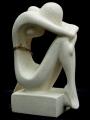 Souvenirs from Greece: Sitting female figure greek cycladic art statue Greek statues Cycladic art statues Excellent greek cycladic art inspired souvenirs handmade cycladic art female statue. The greek cycladic art sculpture shows a woman with her  hands on her folded knees and her head between her hands. The cycladic sculpture has an abstract refined figure and is an excellent greek art decoration gift.