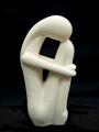 Souvenirs from Greece: Small female figure greek cycladic art statue Greek statues Cycladic art statues Fascinating greek cycladic art inspired souvenirs handmade cycladic art small female statue. The greek cycladic art sculpture shows a woman with her head leaning against her knees and her hands around ther feet. The cycladic sculpture has an abstract refined figure and is an excellent greek art decoration gift.