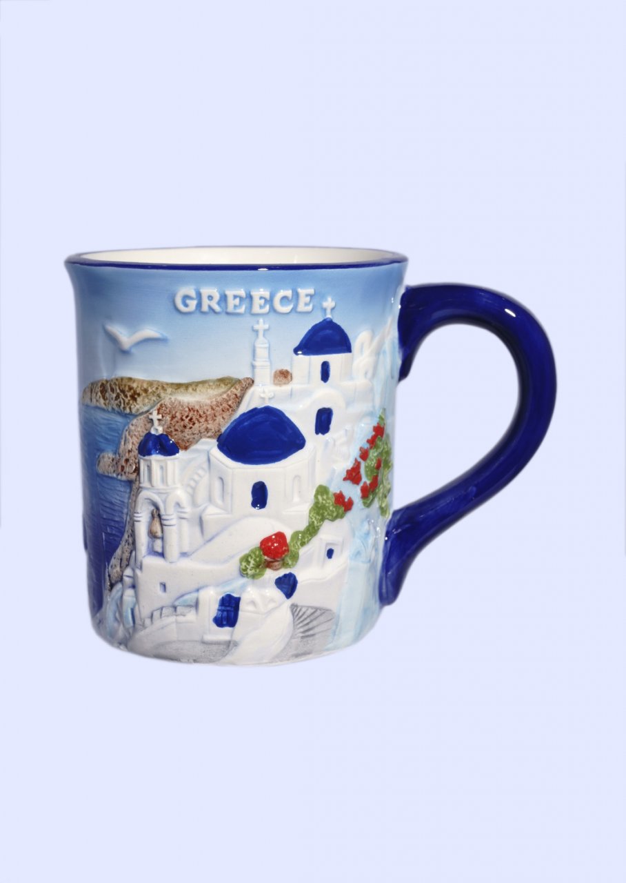 Porcelain mug decorated with a relief of the greek island of Santorini