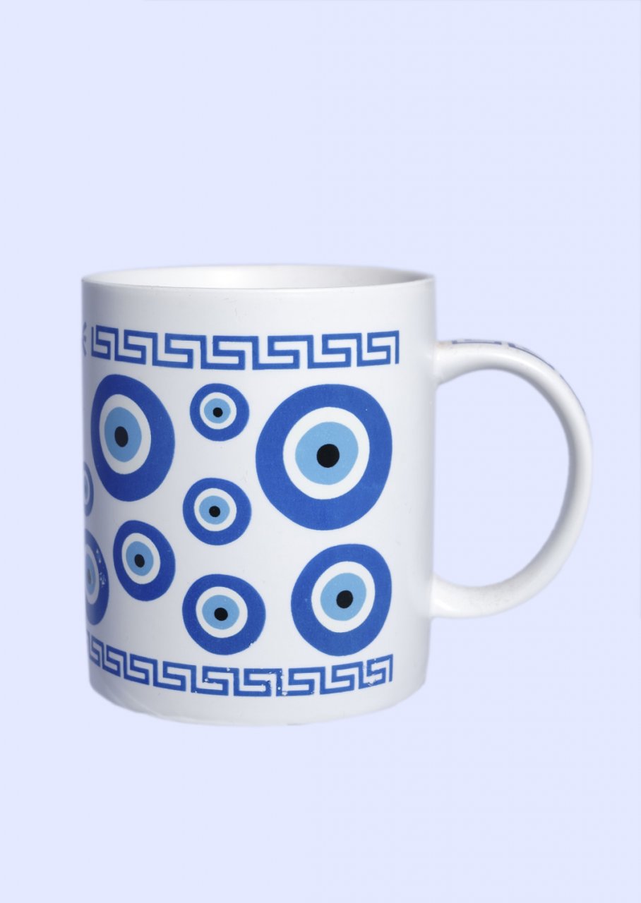 Porcelain mug with Evil Eyes and the Greek key design