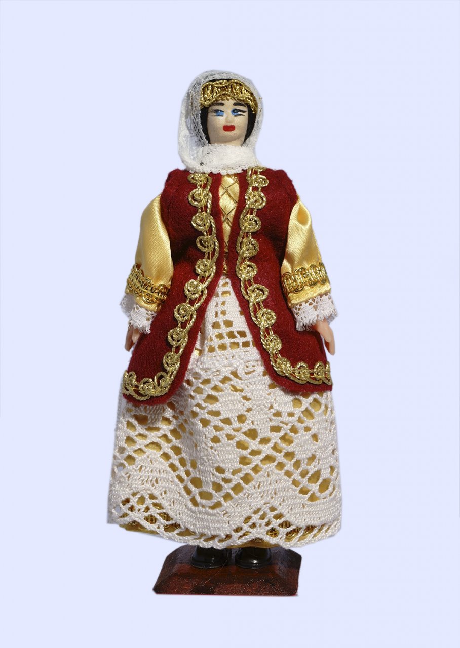 Handmade small doll of an Athenian woman dressed in traditional greek costume