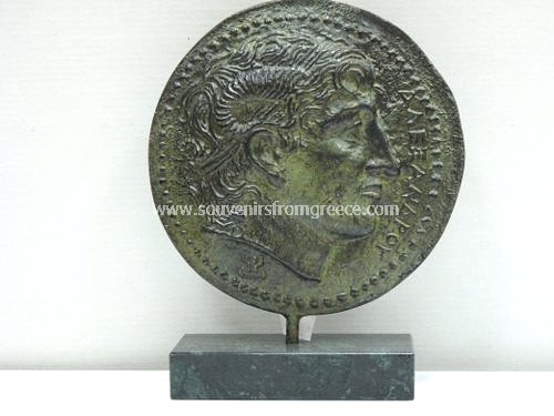 Souvenirs from Greece: Shield with Alexander the great bronze statue Greek statues Greek Busts Sculptures Fascinating art souvenirs from Greece handmade greek bronze statue of shield with Alexander the Great. The bronze sculpture isits on a marble base and is a fabulous greek art decorative gift.