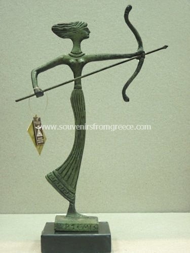 Souvenirs from Greece: Bronze statue of Arthemis the ancient greek goddess of the hunt. Greek statues Bronze statues Lovely greek souvenirs handmade greek bronze statue of Artemis, the ancient greek goddess of  the hunt, wild animals,  childbirth, virginity and young girls, bringing and relieving disease in women. The bronze sculpture sits on a marble base, depicts the goddess as a huntress carrying a bow and arrow. A special decorative greek art gift.