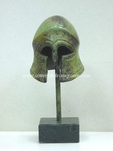 Souvenirs from Greece: Corinthian helmet small greek bronze statue  Greek statues Bronze statues Unique greek art souvenirs handmade greek bronze statue of a Coninthian helmet, takes its name from the city state Corynth was used by greek hoplites in battle. The bronze sculpture sits on a marble base, the perfect greek art decorative gift.