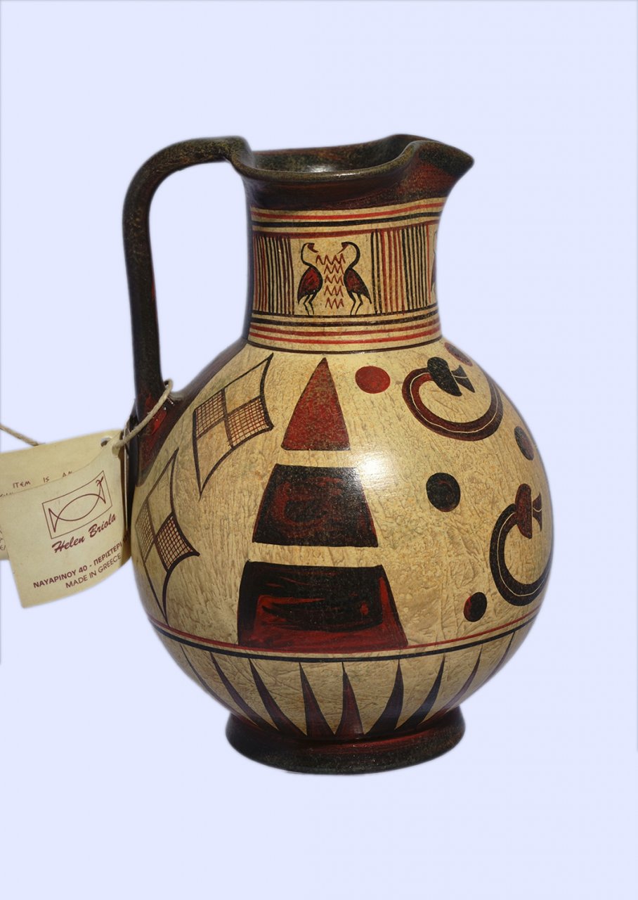 Handmade Minoan jug with geometric and leafy decoration