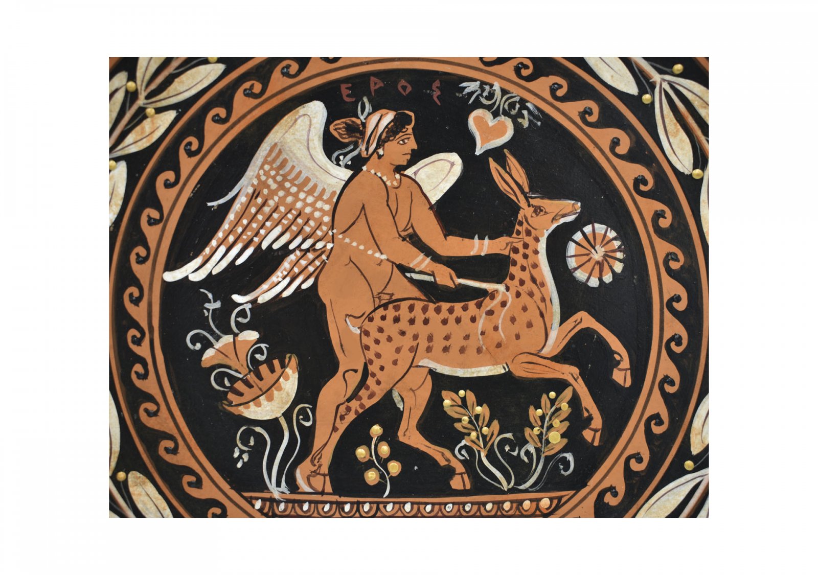 Greek ceramic plate depicting Eros, the Greek god of love, with a fawn