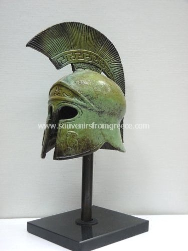 Souvenirs from Greece: Athenian helmet greek bronze statue  Greek statues Bronze statues Outstanding greek art souvenirs handmade greek bronze statue of an Athenean helmet, was used by Athenean hoplites in battle. The bronze sculpture is decorated with two owls the symbol of goddess Athena protector of city of Athens. The bronze sculpture sits on a marble base and is a magnificent greek art decorative gift.
