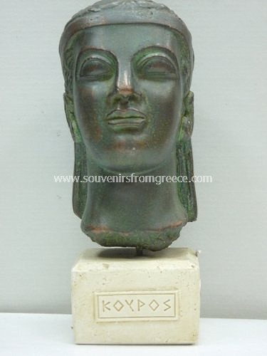 Souvenirs from Greece: Kouros greek plaster bust statue Greek statues Greek Busts Sculptures Cahrming greek bust statue, art souvenir from Greece, handmade greek bust statue of Kouros, young man replica of the original in the Acropolis museum. The green greek plaster bust statue sits on a plaster white base with the name Kouros in greek, a special greek gift. 