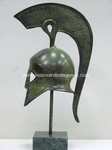 Souvenirs from Greece: Spartan helmet greek bronze statue 
 Greek statues Bronze statues Fantastic greek art souvenirs handmade greek bronze statue of a spartan helmet, worn by Spartan warriors in battle like the battle at Thermopylae between 300 Spartan hoplites lead by Leonidas and the Persians. The bronze sculpture sits on a marble base, the perfect greek art decorative gift.