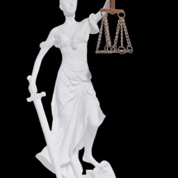 Themis the greek goddess of justice, holding the Scales of Justice and a sword 1